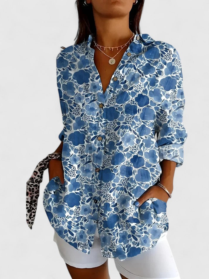 Blouse femme élégante à motifs fleuris. Un top confortable, polyvalent et chic, parfait pour le printemps et l'été.