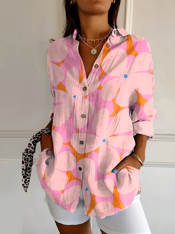 Blouse femme élégante à manches longues, coupe fluide, idéale pour le bureau ou look décontracté chic.