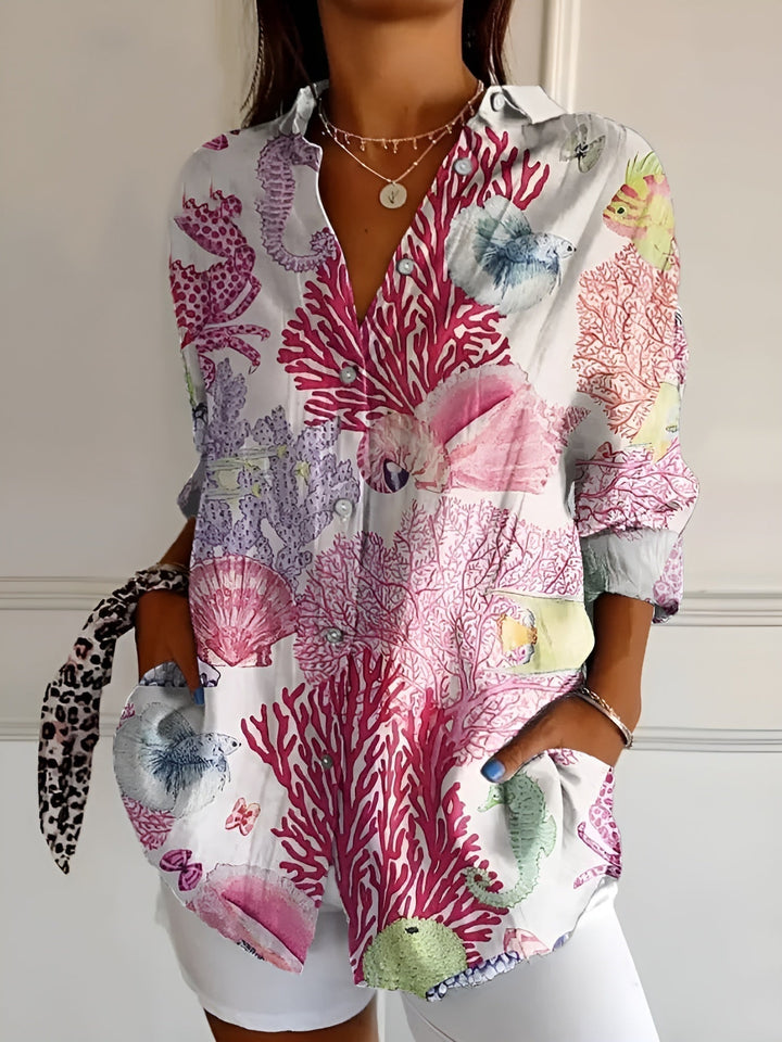 Top femme chic à manches longues, style décontracté et fluide pour une tenue quotidienne. Confort assuré.