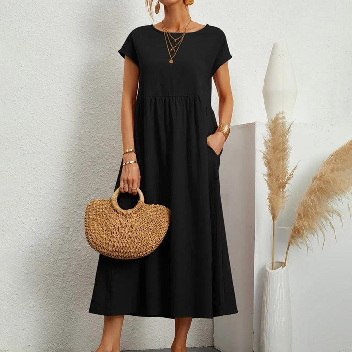 Robe Catherine chic et fluide pour femmes, style essentiel multisaison, très confortable.