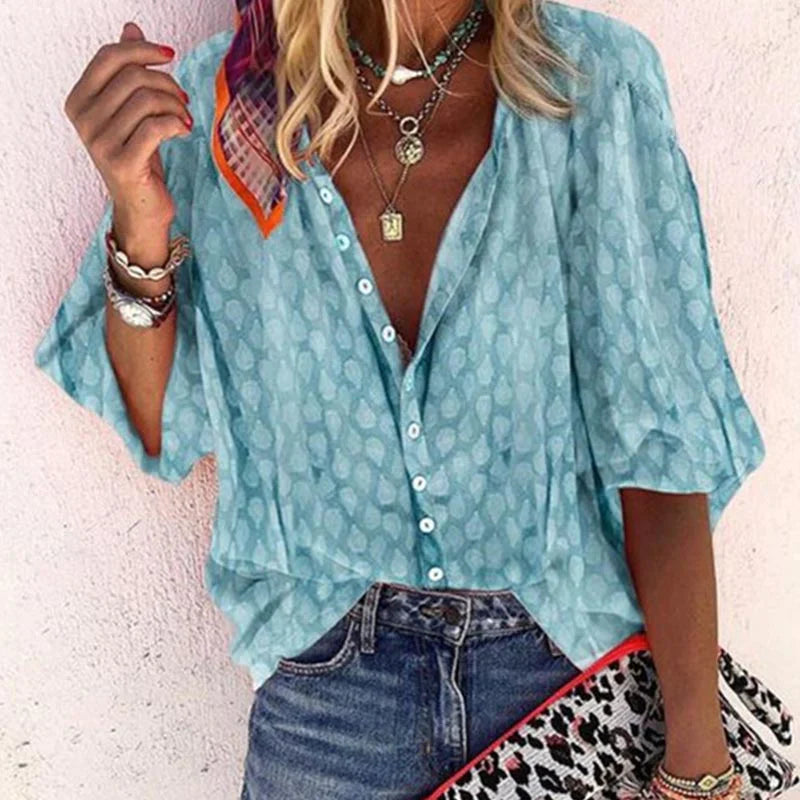 Blouse d'été femme légère et respirante, coupe fluide, idéale pour la mode estivale chic et décontractée.