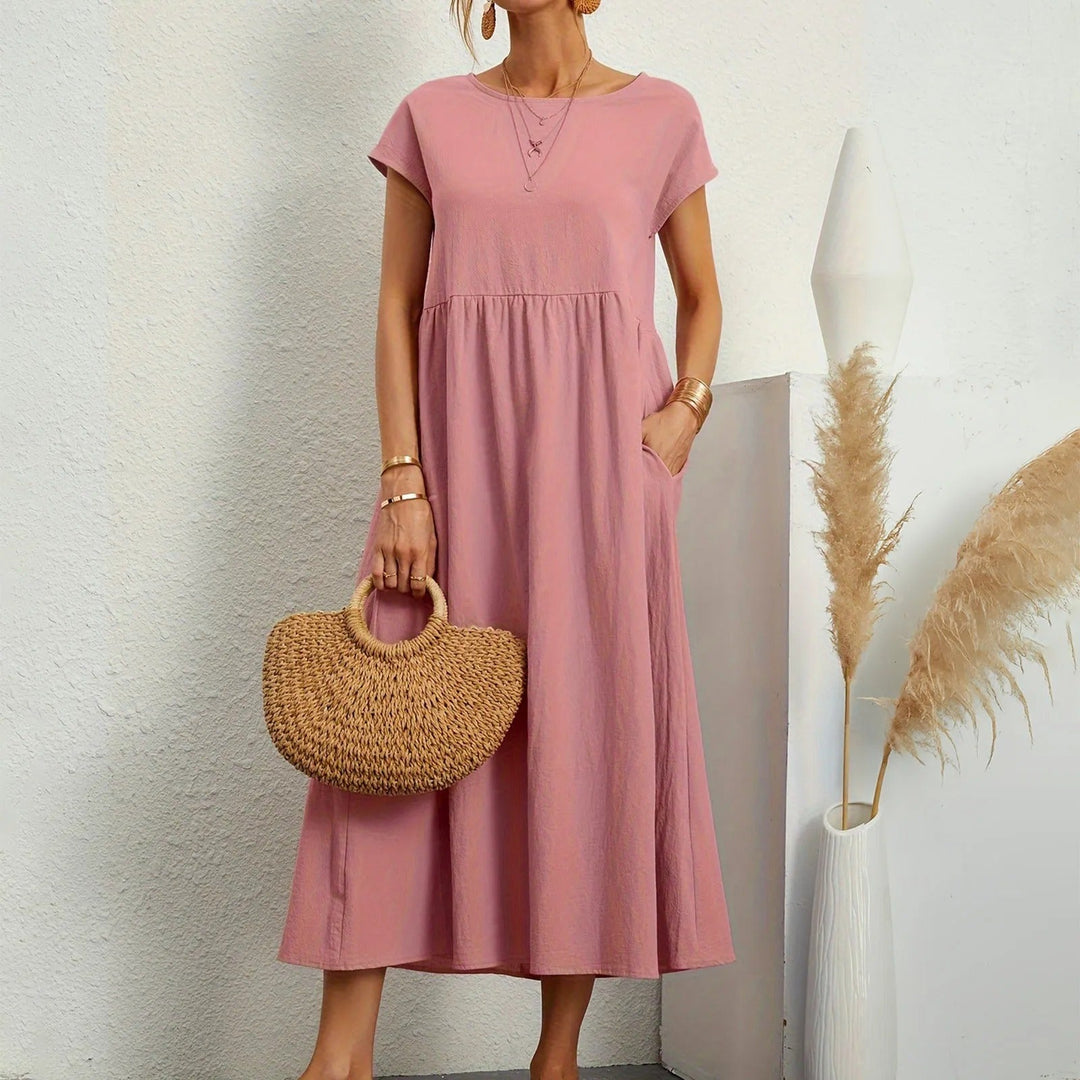Robe élégante Catherine pour femmes, confortable et fluide, idéale pour l'été et les vacances.