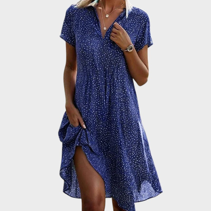 Robe midi fluide à pois pour femme, style rétro chic. Confortable et légère, parfaite pour l'été.