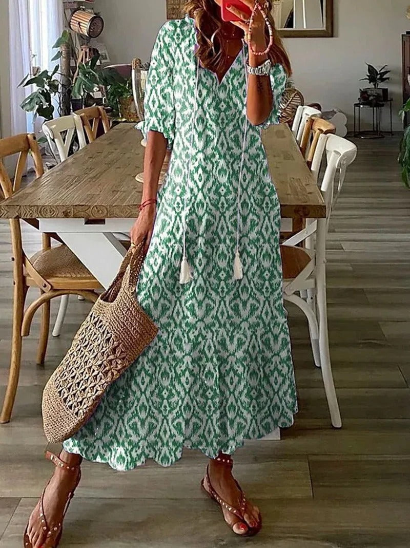 Robe longue femme bohème confortable, style estival aéré, parfaite pour la plage, les vacances et la mode décontractée.