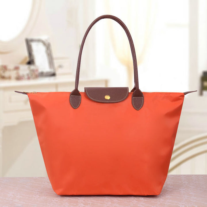 Sac à bandoulière femme, idéal pour l'organisation de vos affaires, un accessoire mode élégant.