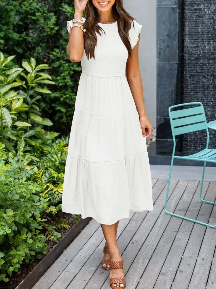 Robe élégante pour femme, coupe flatteuse ventre plat. Un vêtement chic et très confortable.