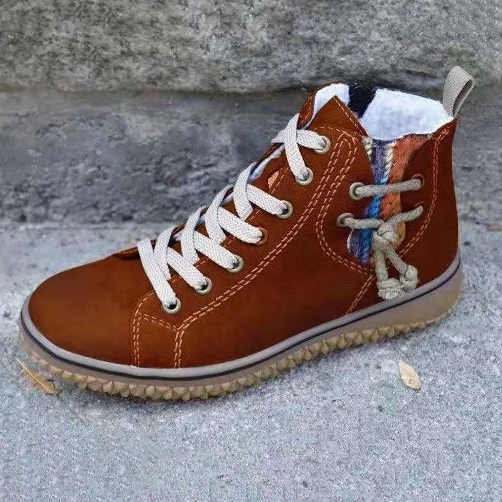 Paire de bottes femme chaudes et confortables, style élégant hivernal. Idéales pour la mode et garder les pieds au chaud.