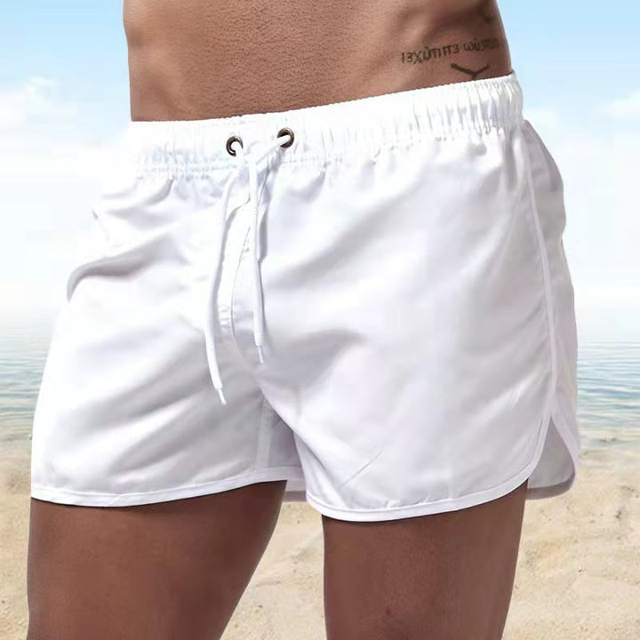Short de bain homme uni Caspian, polyvalent pour la plage, la piscine ou les activités estivales. Séchage rapide.