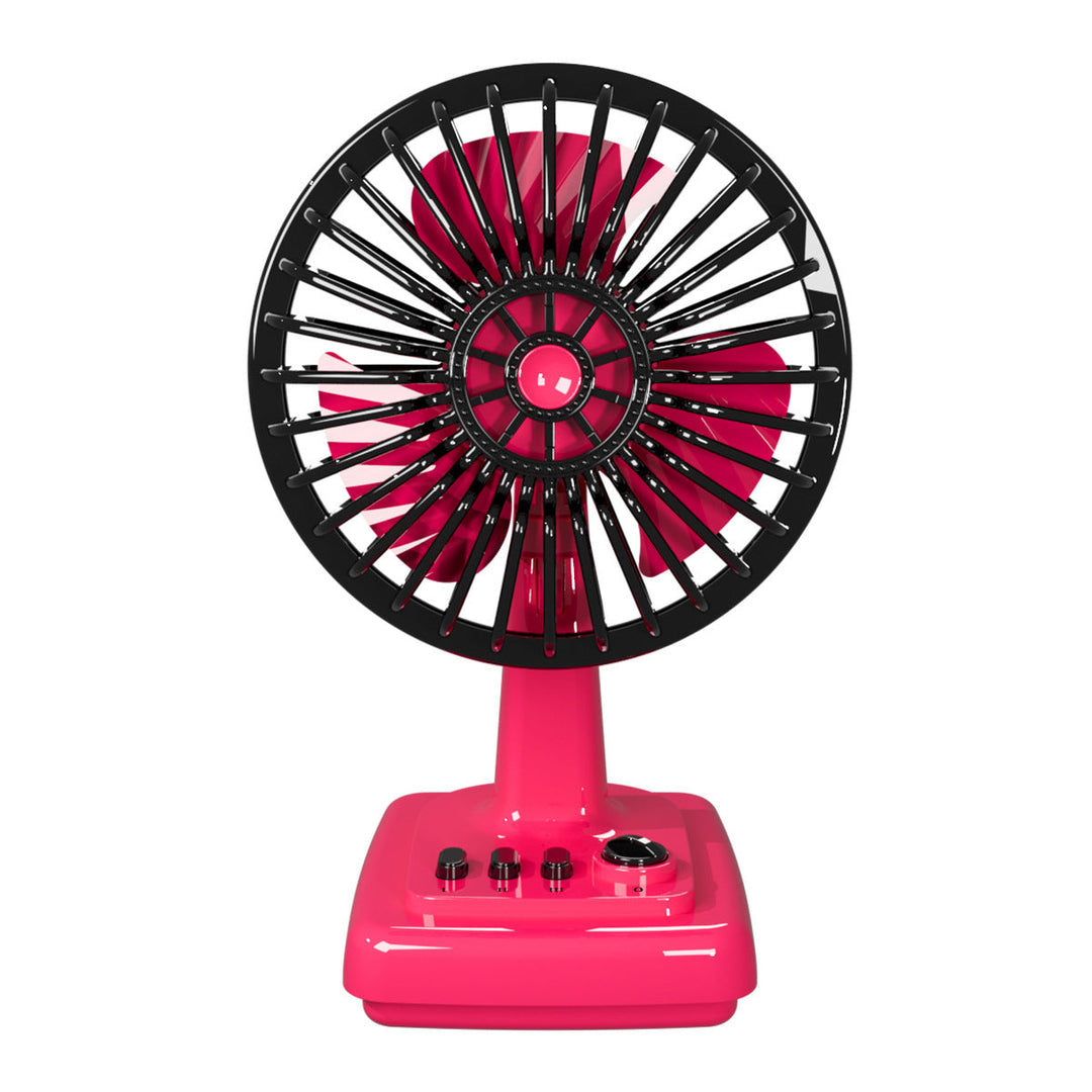 Ventilateur portable et compact pour table, design rétro. Idéal pour un rafraîchissement discret au bureau ou à la maison.