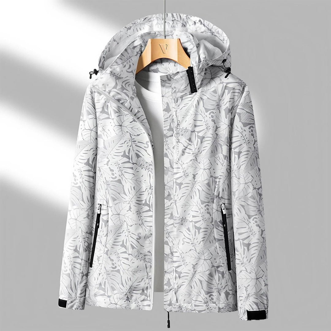 Veste décontractée à motifs floraux et capuche zippée pour un look femme tendance.
