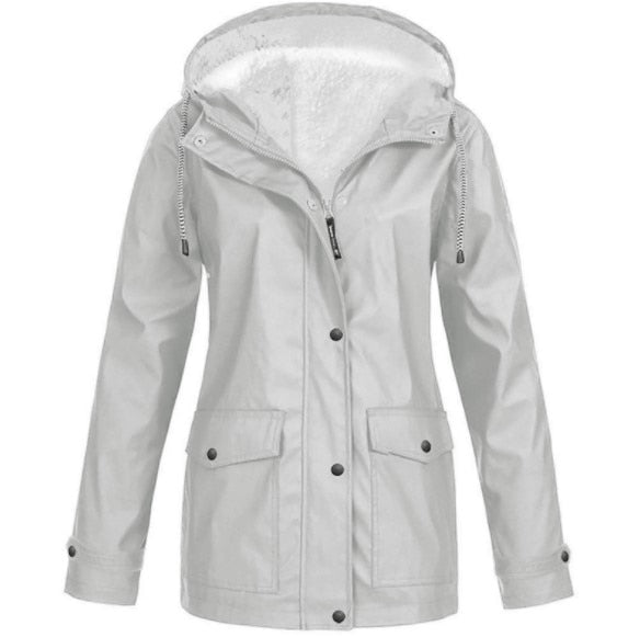Veste femme respirante et confortable, offrant une protection imperméable et coupe-vent pour l'extérieur.