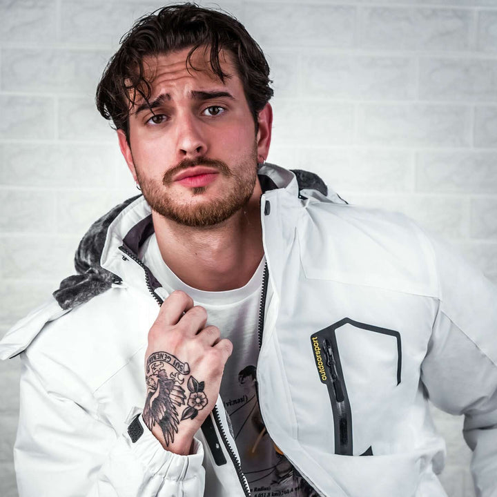 Veste polyvalente homme pour l'hiver, imperméable et chaude, adaptée au ski, snowboard et activités outdoor.