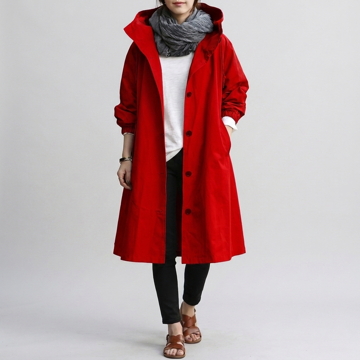 Veste imperméable femme, coupe ample et moderne. Vêtement urbain stylé, parfait pour affronter la pluie.