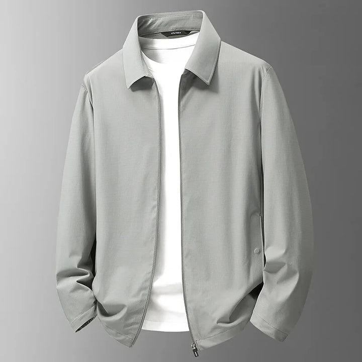 Veste technique homme imperméable, légère et respirante, conçue pour la randonnée, le sport et l'usage outdoor.