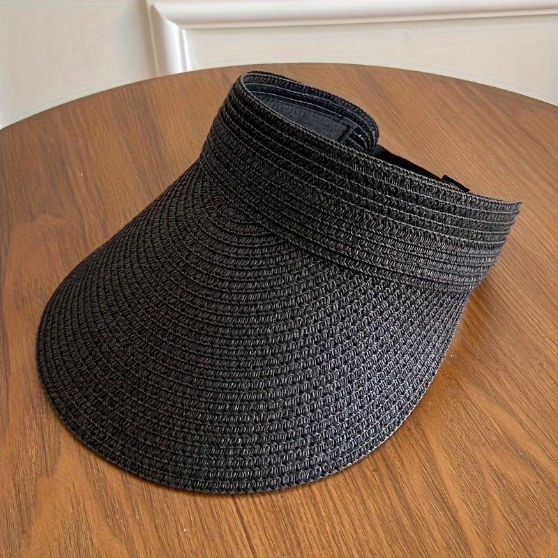 Élégante visière femme pliable large bord pour plage ou vacances d'été. Accessoire de mode anti-UV.