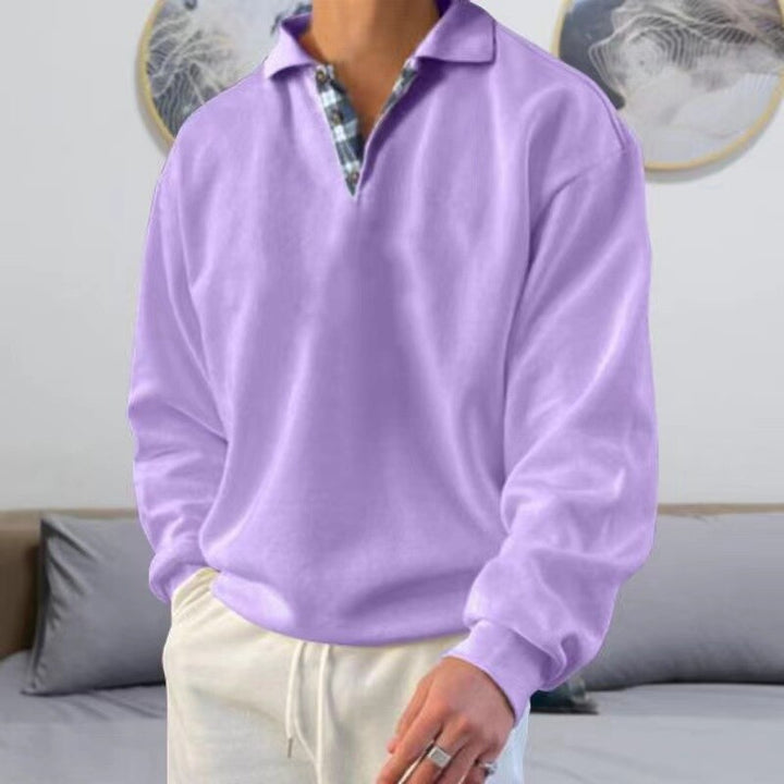 Pull moderne homme à manches longues, apporte une touche d'élégance à tout vêtement décontracté.