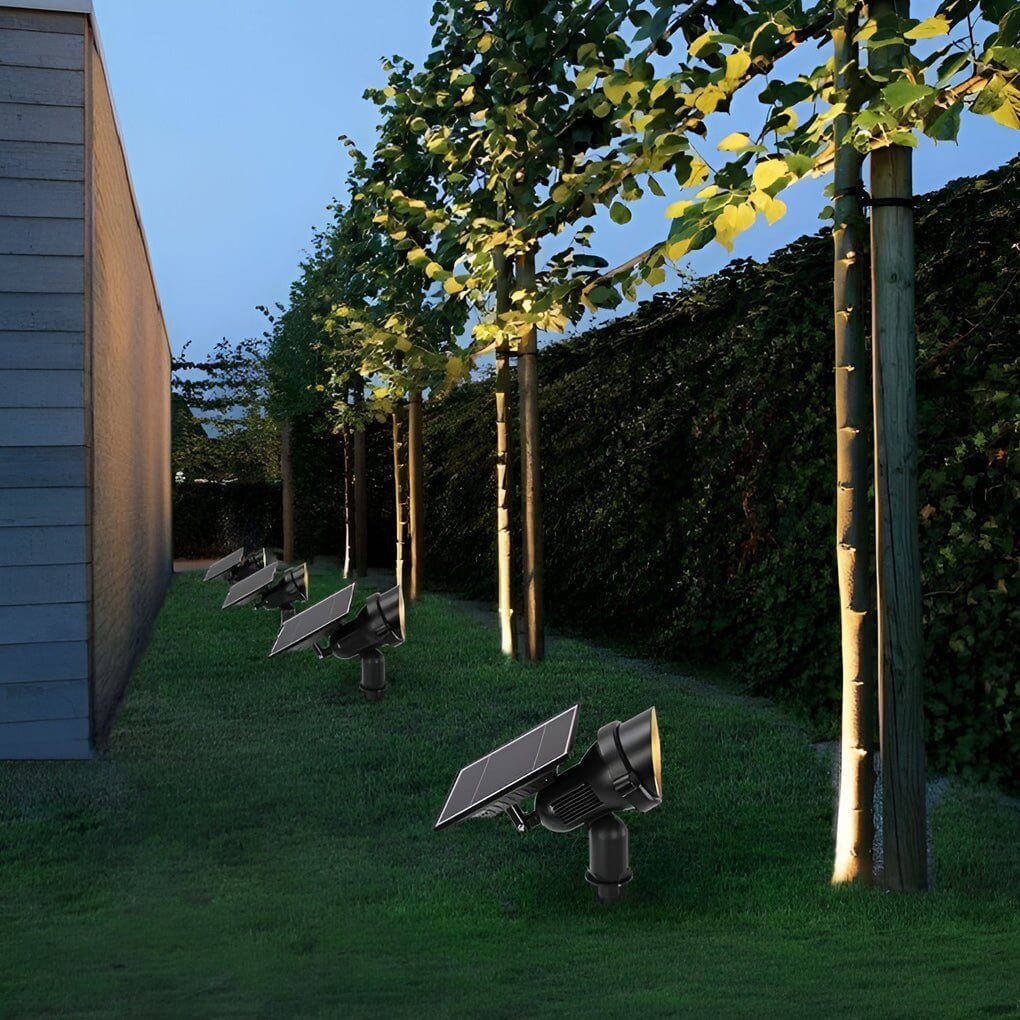Détail du spot solaire LED orientable avec panneau intégré. Éclairage extérieur autonome écologique.