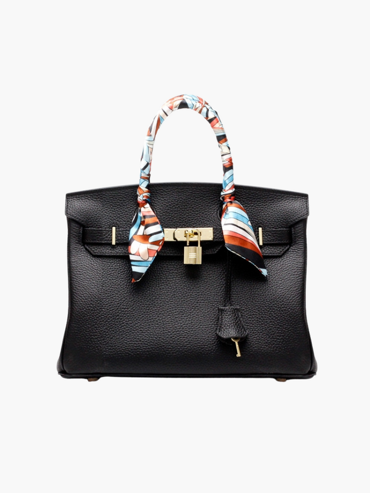 Sac à main classique en cuir, robuste et raffiné, un essentiel pour toute femme.