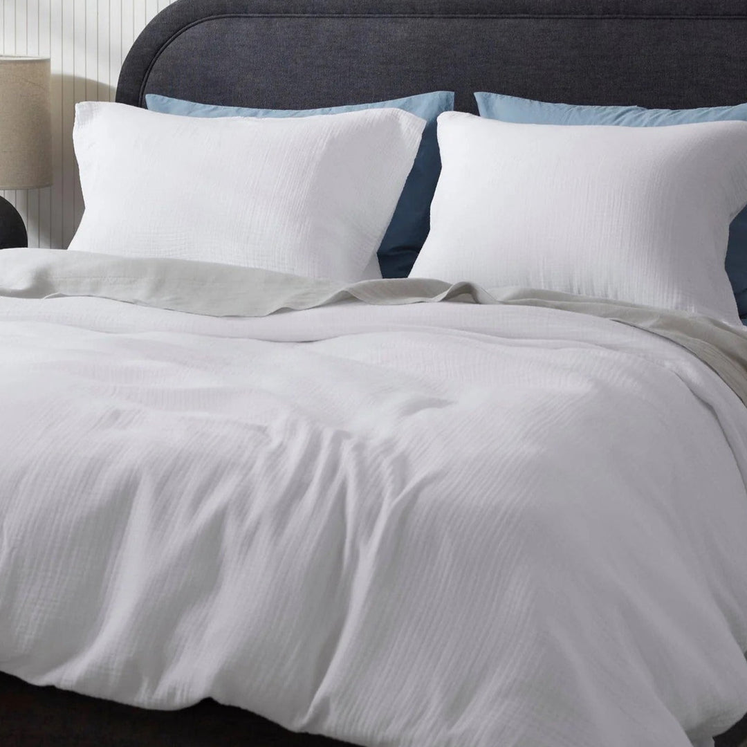 Cadeau parfait : ensemble de 2 taies d'oreiller en mousseline de coton pour un confort de sommeil amélioré.
