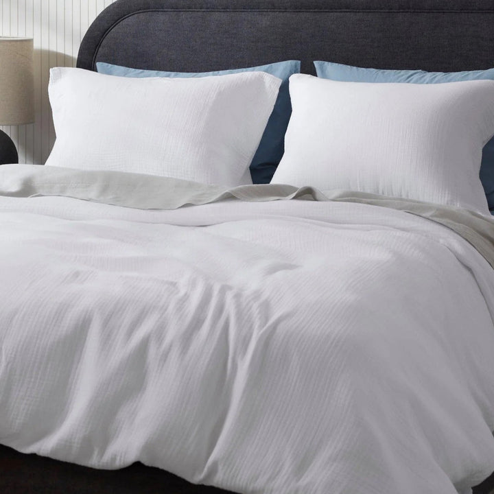 Cadeau parfait : ensemble de 2 taies d'oreiller en mousseline de coton pour un confort de sommeil amélioré.
