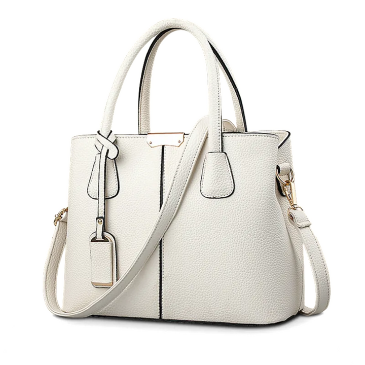 Sac femme grande capacité, bandoulière ajustable. Élégant, accessoire mode tendance pour un look chic.
