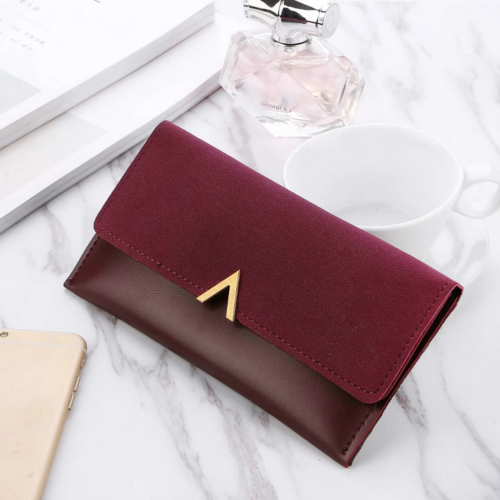 Portefeuille long femme, accessoire mode essentiel alliant style et organisation pour le quotidien élégant.