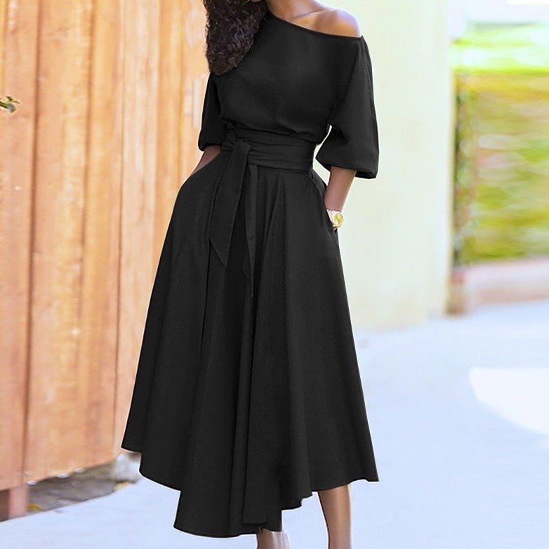 Robe élégante femme style classique, taille cintrée. Parfaite pour soirée ou quotidien chic.