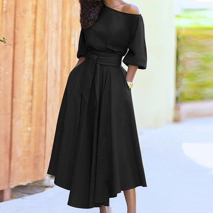 Robe élégante femme style classique, taille cintrée. Parfaite pour soirée ou quotidien chic.