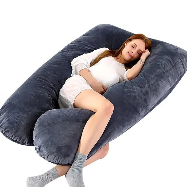Grand coussin de soutien pour le corps entier, assurant confort et bien-être pour un sommeil réparateur.