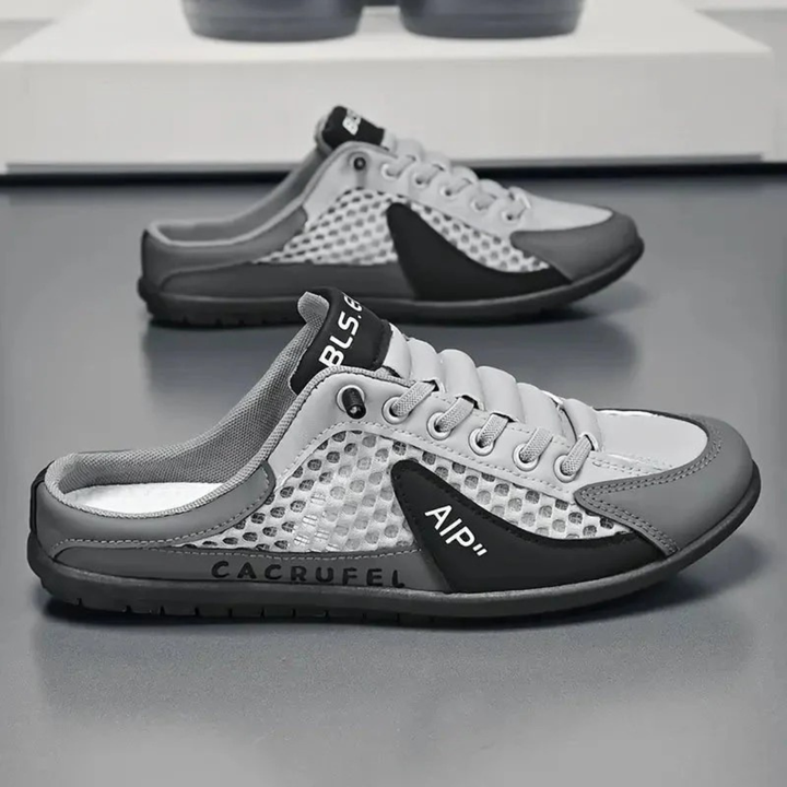 Baskets homme Elias au design ajouré élégant, ajoutant une touche de style à votre tenue estivale.