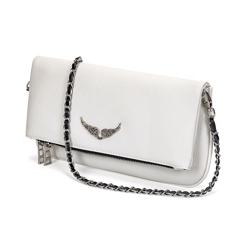 Accessoire mode femme, pochette Ravenna polyvalente, chic pour soirée ou quotidien élégant.
