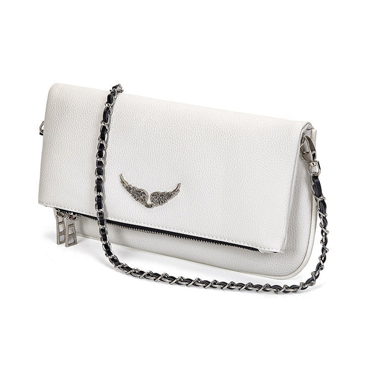 Accessoire mode femme, pochette Ravenna polyvalente, chic pour soirée ou quotidien élégant.