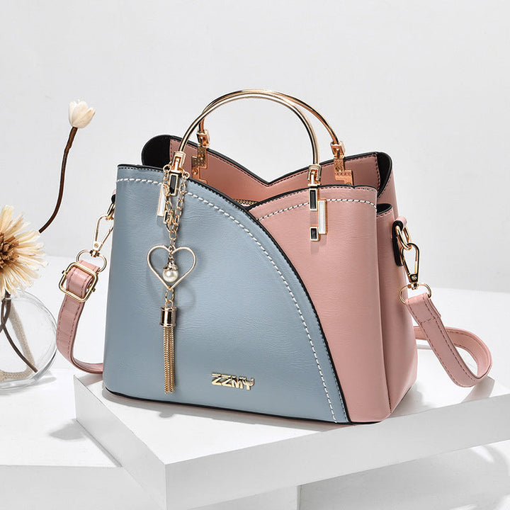 Sac bandoulière polyvalent pour femme, parfait pour transporter vos essentiels avec élégance.